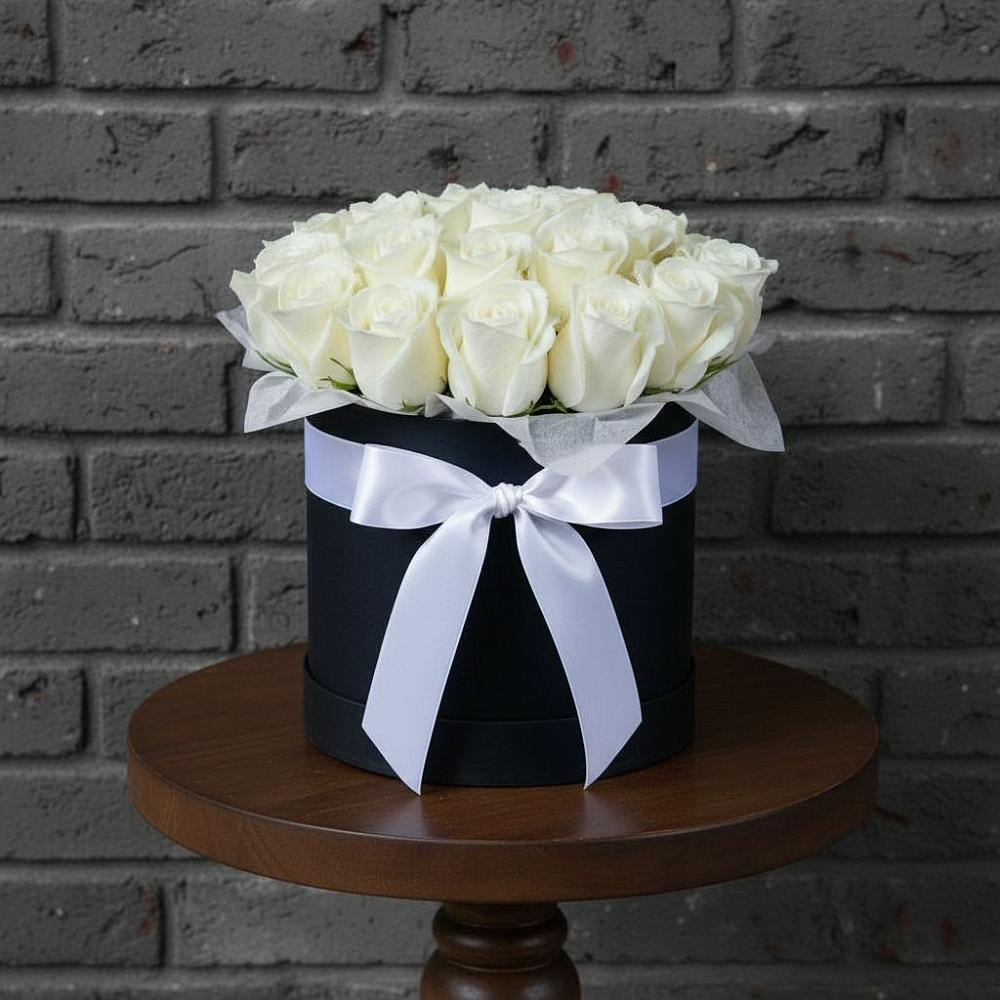 Цветочная композиция из Розы в шляпной коробке в Тюкалинске